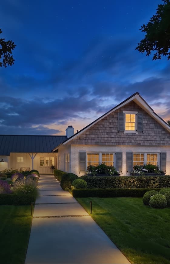 A home at dusk with fresh exterior design